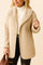 Front detail view of an open-front cream ribbed hooded coat with long sleeves, wide lapels and rounded hem