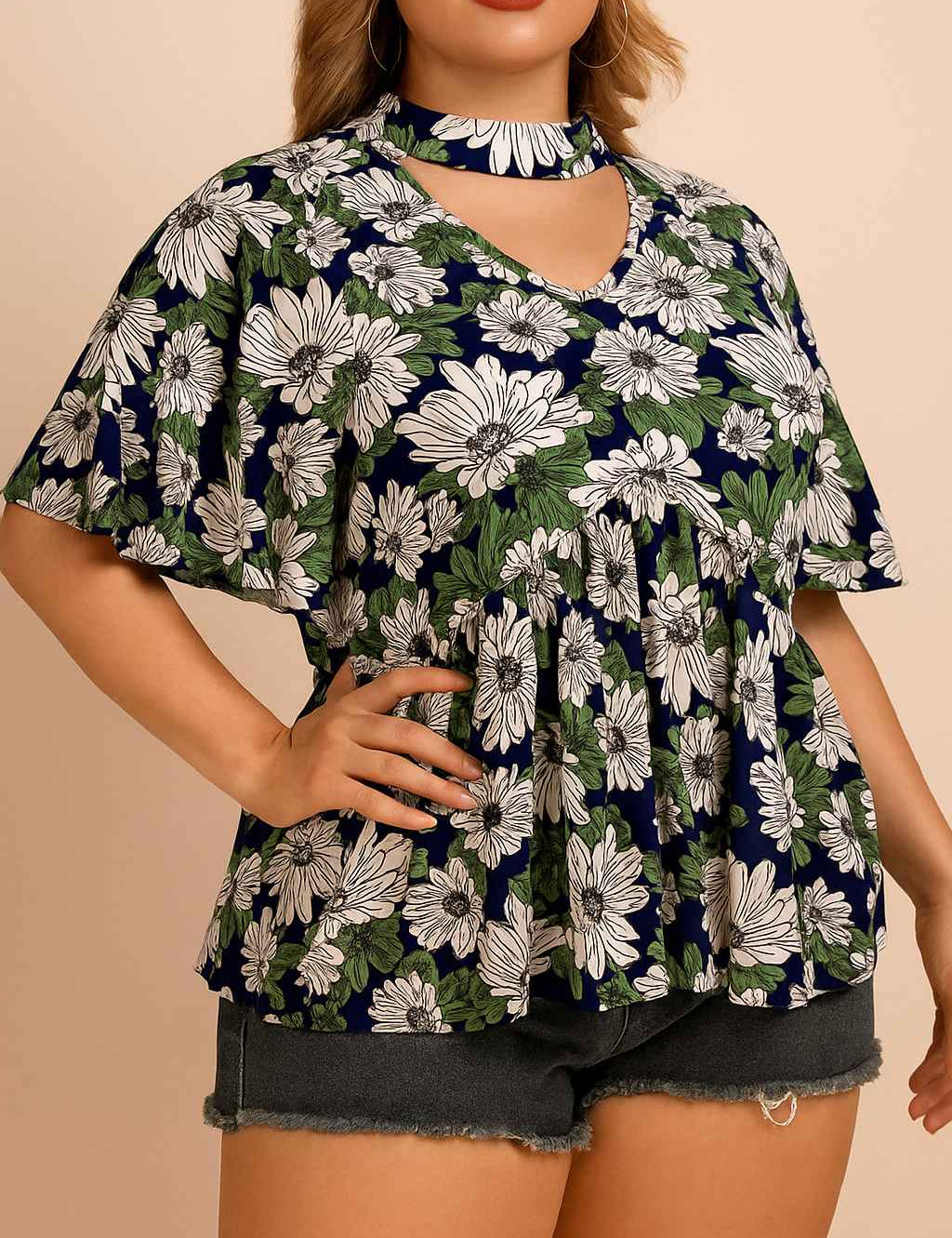 Front view of a women’s dark blue floral blouse with a V-neck cutout choker neckline, flutter short sleeves and a relaxed gathered hem (plus size)