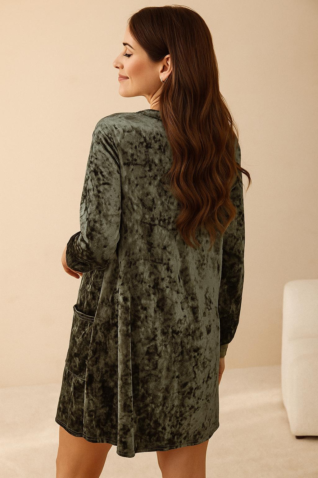 Dark-green velvet mini dress with plush texture, clean back panel and straight mini hem — back view