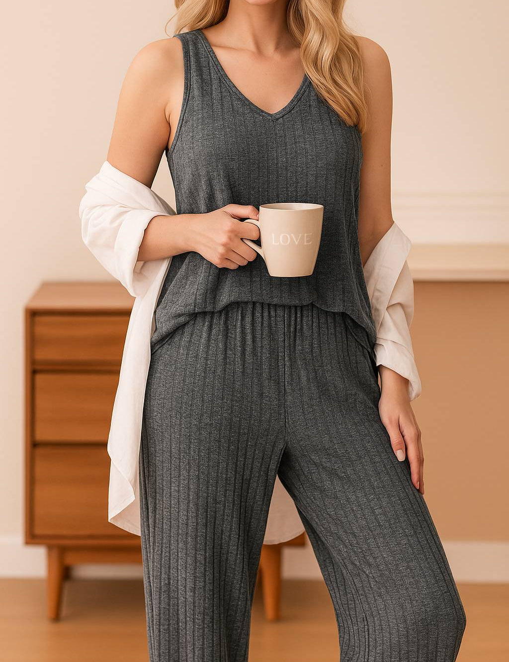 Women's dark grey ribbed knit loungewear pajama set with sleeveless top and relaxed fit pants

