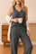 Women's dark grey ribbed knit loungewear pajama set with sleeveless top and relaxed fit pants

