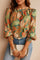 Women’s green tropical leaf-print long-sleeve blouse with gathered crew neckline and smocked cuffs — front view