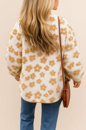Back view of the ivory sherpa jacket with camel floral texture and a clean rounded hem.