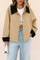 Front view of a women’s khaki color-block button-up casual jacket with black contrast shirt collar and cuffs, drop-shoulder sleeves and slant welt pockets.