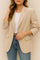 Front view of a women’s khaki longline blazer with notched lapel, single-breasted front, long sleeves and flap pockets