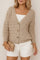 Front view of a women’s khaki textured V-neck cardigan with gold-tone button-front, balloon sleeves, and ribbed cuffs and hem.