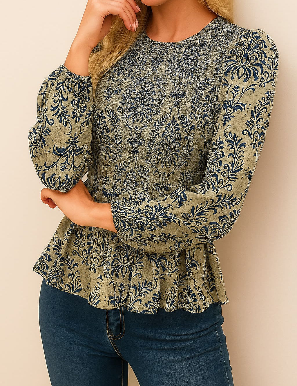 Front view of the navy damask smocked peplum blouse showing the round neck, smocked bodice and gathered hem ruffle; long sleeves with elastic cuffs