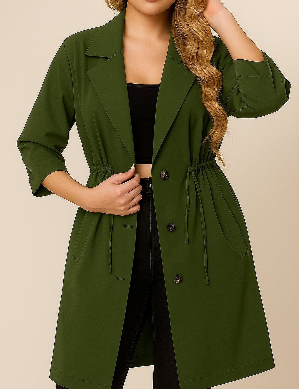 Front view of a women’s olive green plus-size lapel trench coat with roll-tab sleeves, drawstring waist and slant welt pockets; rounded straight hem.