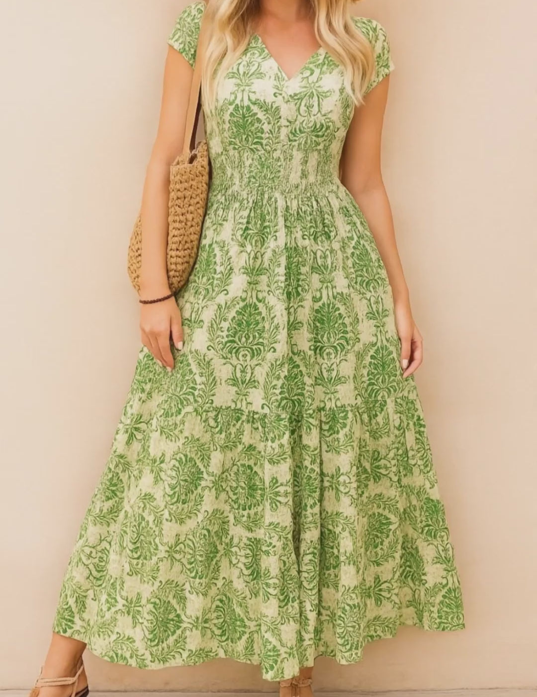 Boho-print V-neck cap-sleeve maxi dress with smocked bodice and flowing skirt, shown in purple, green and dark-blue colorways — studio lookbook video.