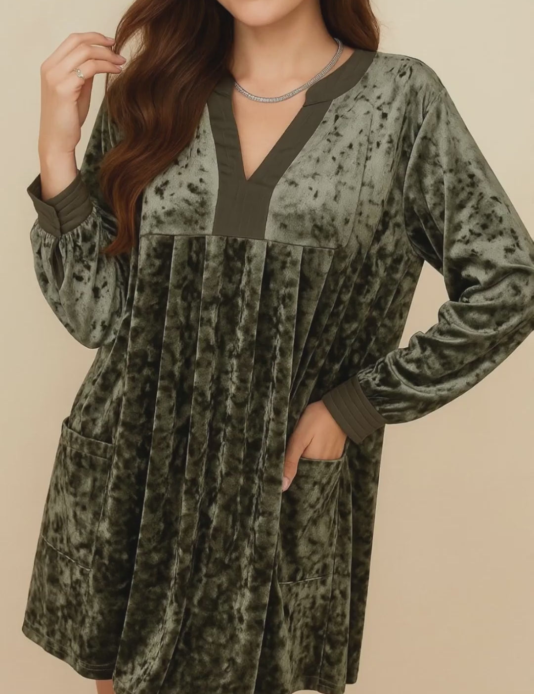 Dark-green velvet mini dress with notched V neckline, long sleeves and side pockets — studio lookbook video