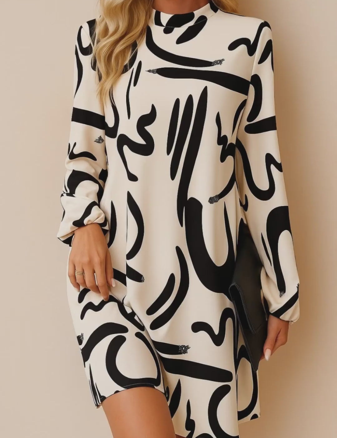 Cream abstract-print mock-neck long-sleeve mini dress with relaxed A-line drape and keyhole back — studio lookbook video