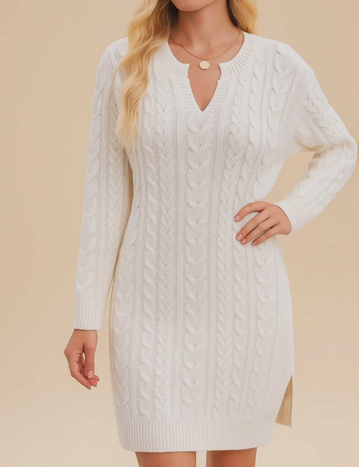 Short lookbook video showcasing a women’s cable-knit sweater dress with V-notch neckline, long sleeves, ribbed hem and a subtle side slit, presented in clean studio lighting.