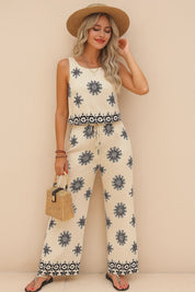 Short studio lookbook video showing a beige sleeveless printed top with drawstring waist and matching wide-leg pants with elastic waist.