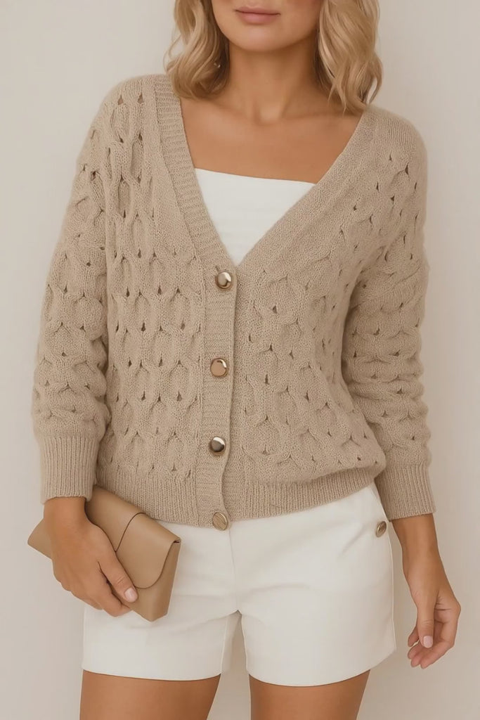 Short lookbook video of a khaki textured V-neck cardigan showing the gold-tone button-front, soft balloon sleeves, and ribbed cuffs and hem in studio lighting.