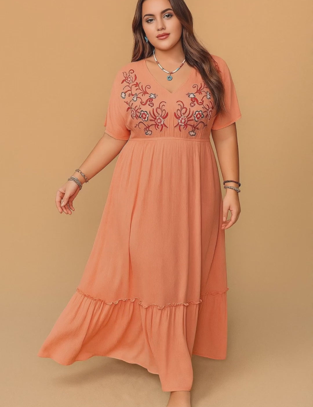 Plus-size coral embroidered V-neck frill maxi dress with empire waist and tiered frill hem — studio lookbook video.