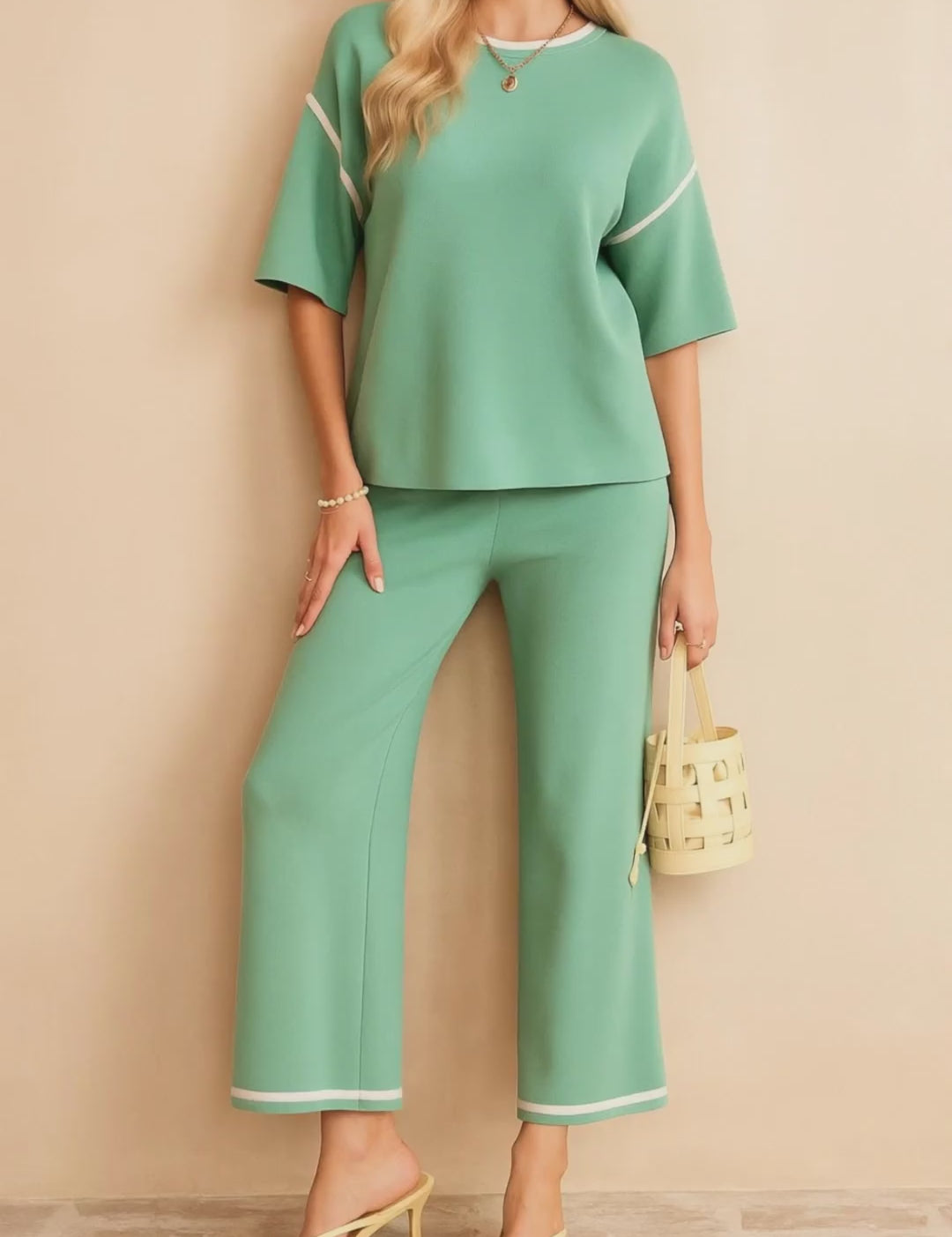Short studio lookbook video of the Gum Leaf contrast-trim lounge set with elbow-sleeve top and wide-leg pants.