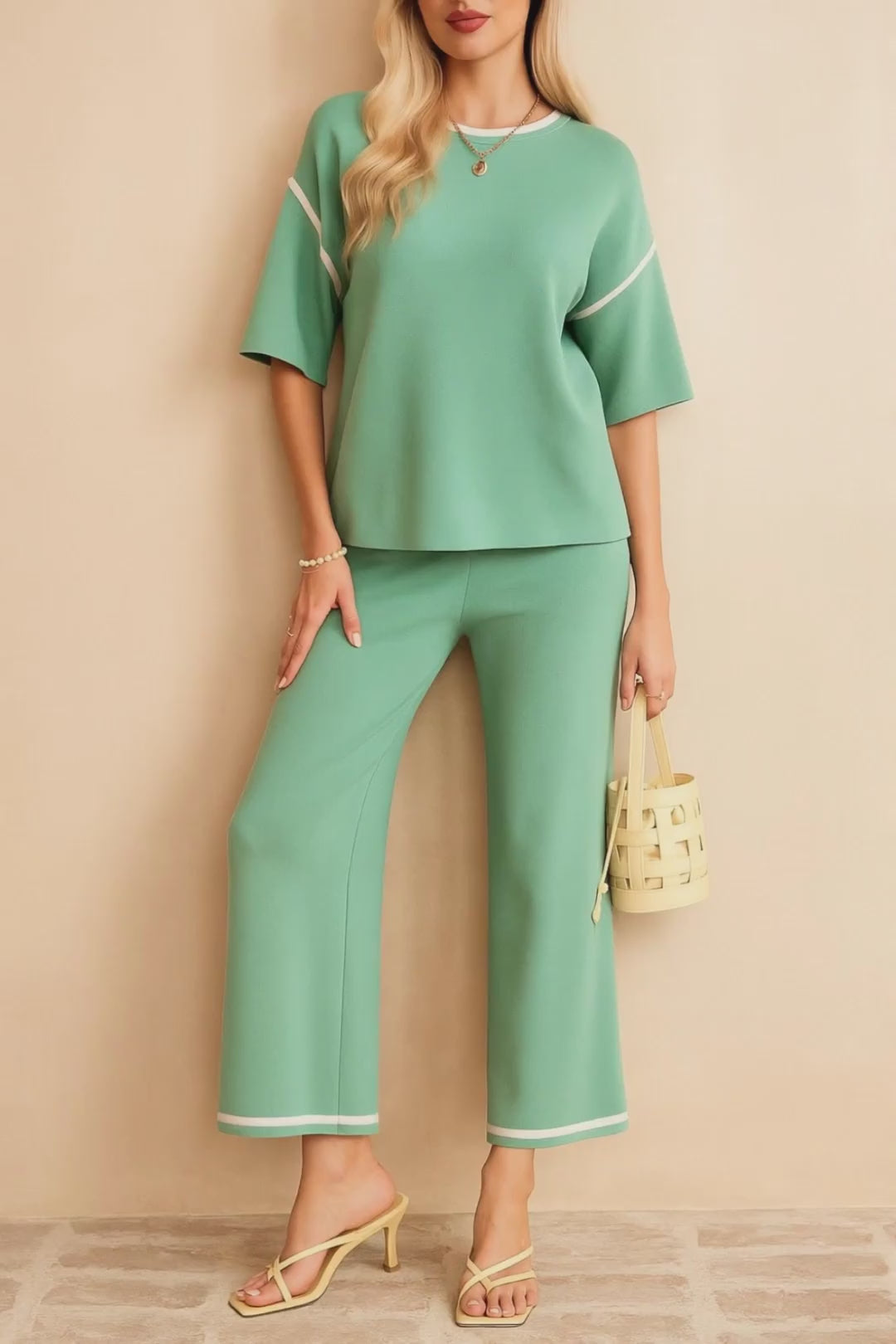 Short studio lookbook video of the Gum Leaf contrast-trim lounge set with elbow-sleeve top and wide-leg pants.