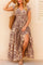 Women’s purple boho-print V-neck cap-sleeve maxi dress with smocked bodice and side slit — front view.