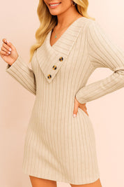Close three-quarter front view of a women’s ribbed knit sweater dress featuring an asymmetric foldover V-neck collar with three buttons, long sleeves and a slim above-knee hem.