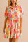Floral button-down babydoll dress in strawberry multi with shirt collar, puff sleeves and tiered mini skirt — front view