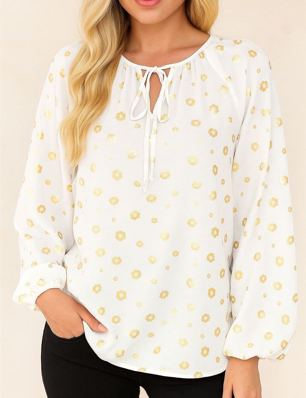 Women’s white tie-neck blouse with gold-foil dot print, long sleeves and elastic cuffs — front view.