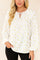 Women’s white tie-neck blouse with gold-foil dot print, long sleeves and elastic cuffs — front view.