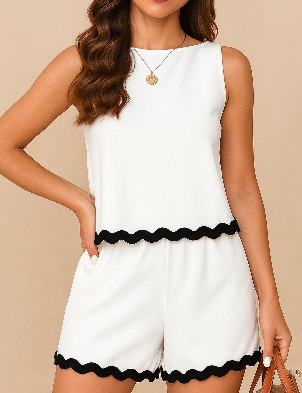 Front view of a white ric-rac trim tank-and-shorts two-piece set with black wave hem and side pockets